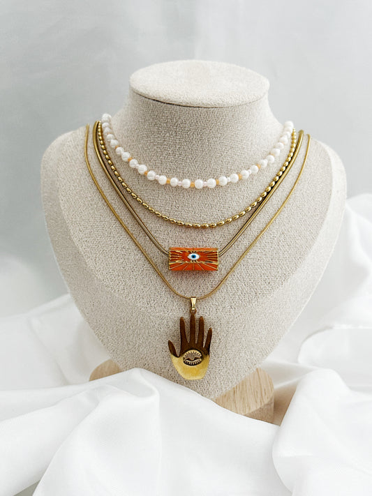 4-teiliges Ketten-Set aus Edelstahl in Gold – Layering Look mit Süßwasserperlen, Nazar-Auge-Anhänger und Hamsa-Hand