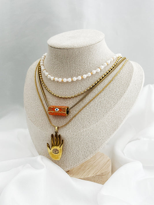 4-teiliges Ketten-Set aus Edelstahl in Gold – Layering Look mit Süßwasserperlen, Nazar-Auge-Anhänger und Hamsa-Hand